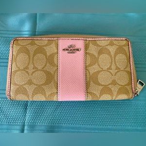 Coach wallet, pink and tan with Coach logo